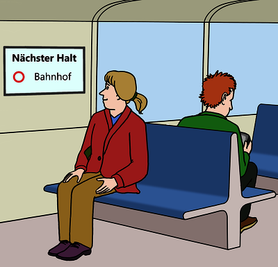 Personen sitzen in einem Fahrzeug